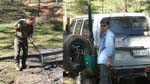 21-Laurie puts out a smoldering campfire - Heidi fetches water to help